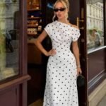 Women's dress with polka dot pattern and boat neckline