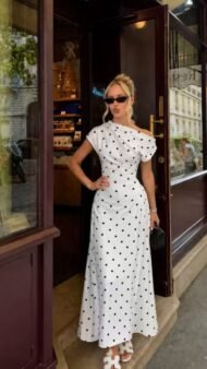 Women's dress with polka dot pattern and boat neckline
